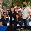 UC Tech 2025 volunteers smiling for the camera.