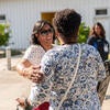 Attendees socializing with each other.