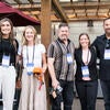 Attendees smiling for the camera.