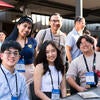 Attendees smiling for the camera.
