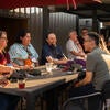 Attendees socializing with each other.