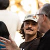 Attendees socializing with each other.