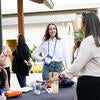 Attendees socializing with each other.
