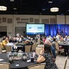Attendees socializing with each other.