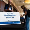 Registration check-in booth at the venue.