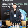 Sponsor representative at their booth.
