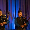 UC Riverside Pipe Band performing on stage.