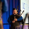 UC Riverside Pipe Band performing on stage.
