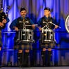 UC Riverside Pipe Band performing on stage.