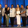 UC Tech Awardees smiling at the camera with UC CIOs.