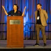 UC Office of the President CIO, Molly Greek (L), and UC Riverside CIO, Matthew Gunkel (R), speaking at the podium.