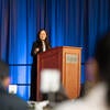 Closing keynote speaker, Yue Dong from UC Riverside's Computer Science and Engineering department, speaking at the podium.